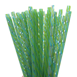 May include: A bundle of clear, reusable drinking straws. The straws are a light green color with a spiral design of yellow and blue stripes. The straws are made of glass and are a sustainable alternative to plastic straws.