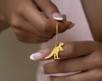 Minimalistische T-Rex Dinosaurier Halskette | Gold oder Silber Dino Schmuck | Niedliche Tier Anhänger Geschenk für Frauen | Jura Halskette | Tyrannosaurus Großbritan