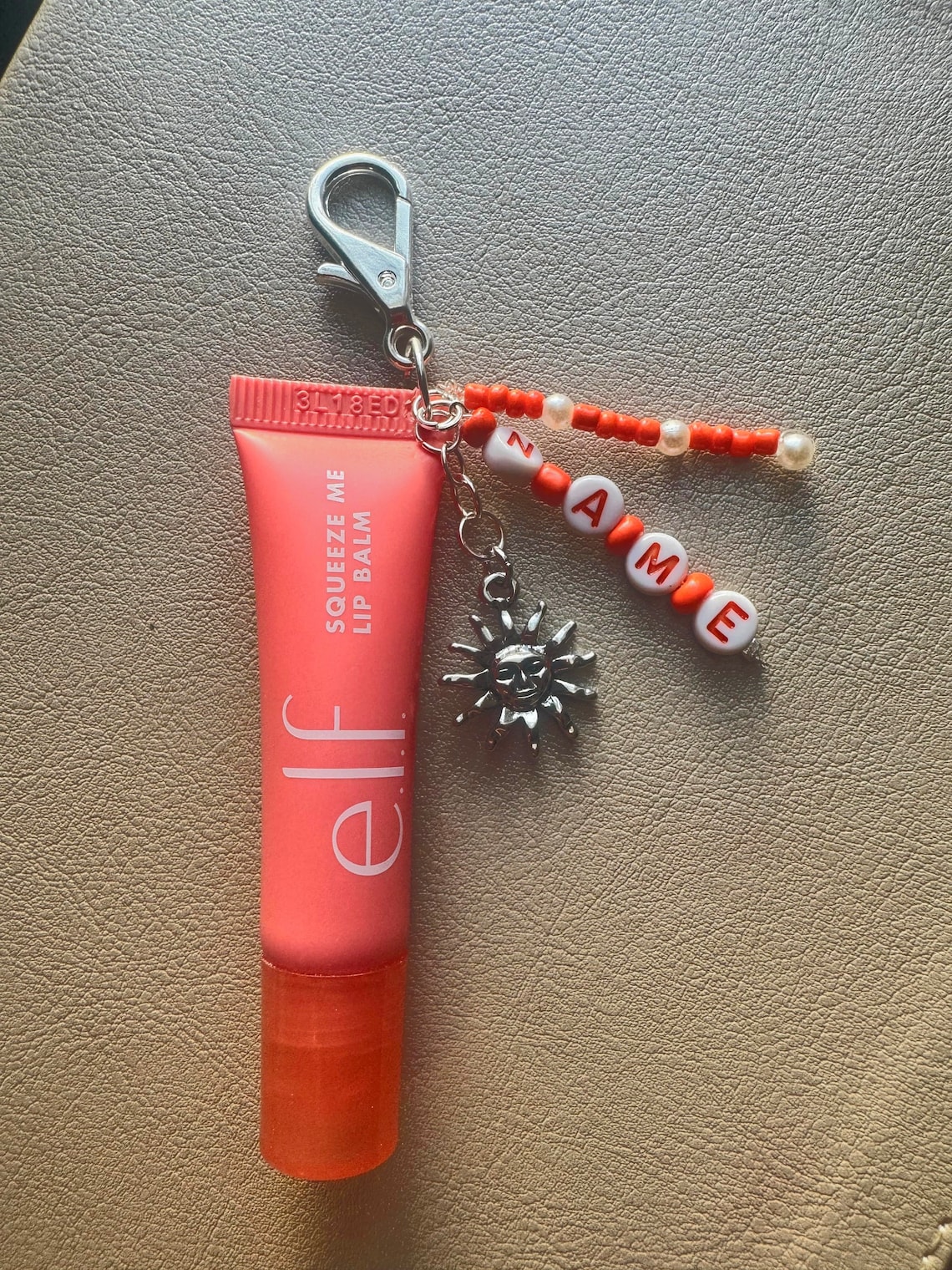 nike lip gloss keychain