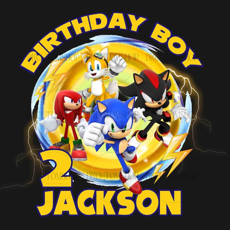 May include: A birthday party design featuring Sonic the Hedgehog, Tails, Knuckles, and Shadow the Hedgehog. The design is yellow, blue, red, and black with a lightning bolt pattern. The text "Birthday Boy" and "Jackson" are in yellow. The number "2" is in yellow and blue.