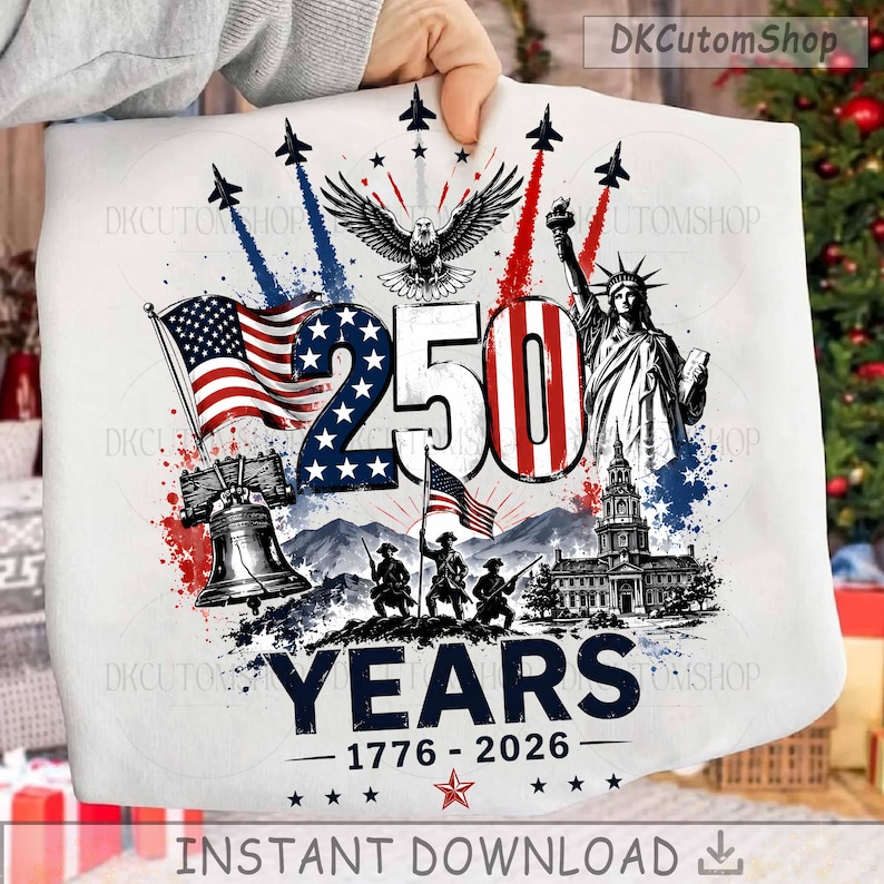 May include: A white t-shirt featuring a patriotic graphic with the text 250 YEARS 1776-2026. The design includes the Statue of Liberty, the Liberty Bell, an eagle, soldiers, American flags, and fighter jets in red, white, and blue colors.