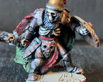 Sciborminiatures Undead Warrior with round shield fighting.  33mm heroic fantasy. Painted with acrylics.