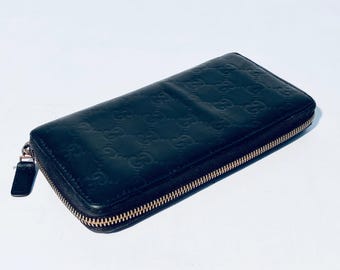 Cartera Gucci original de piel negra con monograma Guccissima
