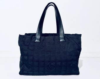 Bolso negro Chanel Nueva línea de viaje Tote Auténtico Vintage