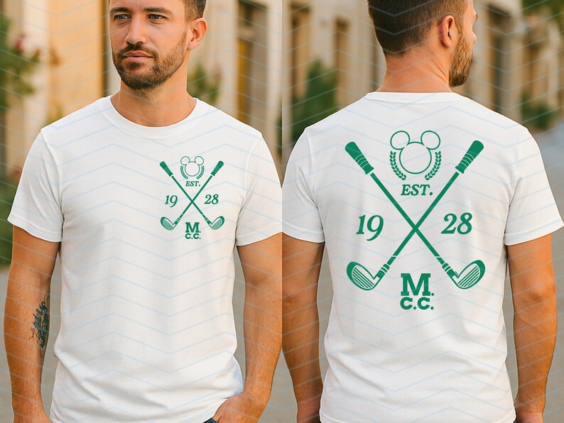 May include: White t-shirt with a green golf-themed design. The design features crossed golf clubs, a Mickey Mouse silhouette, the text "EST. 1928", and "M.C.C.". The same design is on the front and back of the shirt.