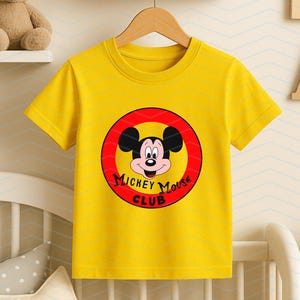 May include: A bright yellow short-sleeved t-shirt featuring a circular graphic on the chest. The graphic contains a red border, a yellow center, and the face of Mickey Mouse with the black text Mickey Mouse Club printed underneath the character.