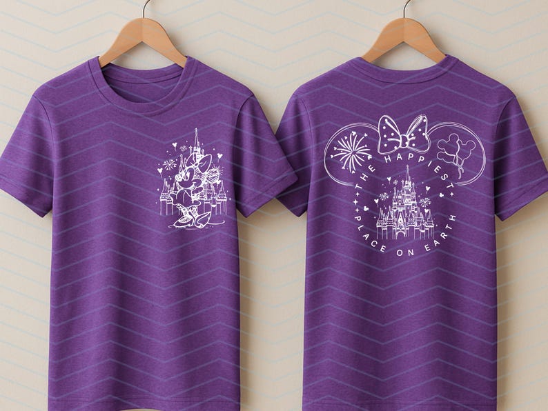 May include: Purple t-shirt with a white Minnie Mouse graphic on the front and a matching design on the back. The back design includes the text "The Happiest Place on Earth" and a castle illustration.