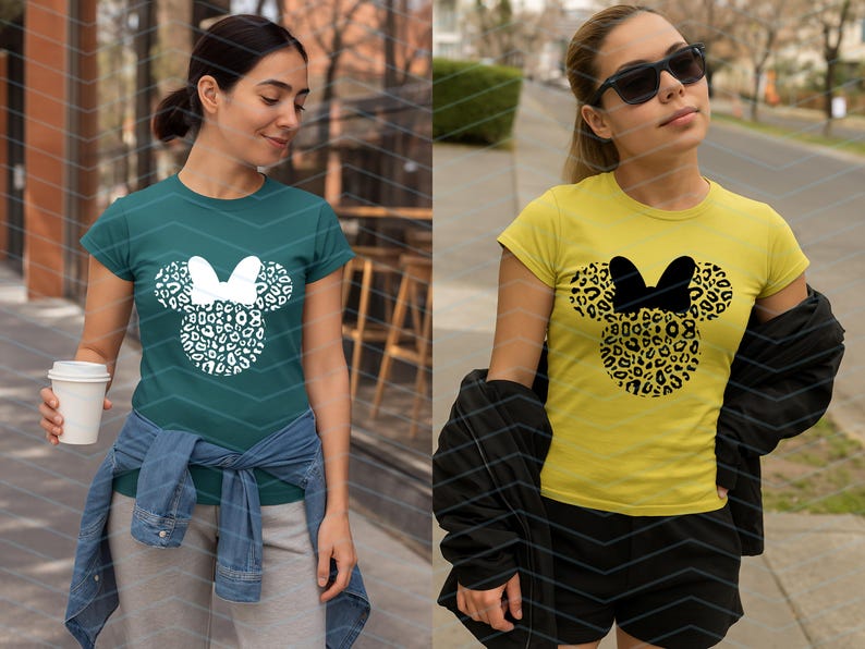 May include: Two women wearing t-shirts with a Minnie Mouse design. One shirt is teal with a white leopard print design, and the other is yellow with a black leopard print design. Both shirts have a bow.