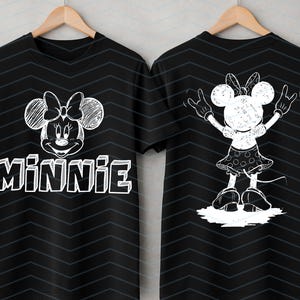 May include: Black t-shirt with a white Minnie Mouse design on the front and back. The front displays Minnie's face and the name "Minnie". The back features a full-body illustration of Minnie Mouse with her arms raised in a celebratory pose.