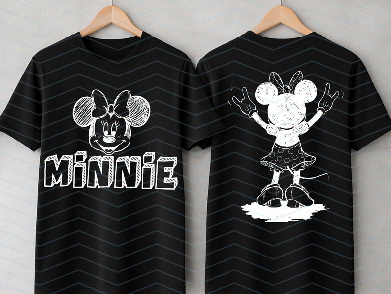 May include: Black t-shirt with a white Minnie Mouse design on the front and back. The front displays Minnie's face and the name "Minnie". The back features a full-body illustration of Minnie Mouse with her arms raised in a celebratory pose.
