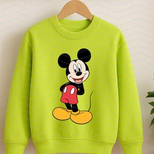 May include: A lime green long-sleeve sweatshirt featuring a centered graphic print of Mickey Mouse. The character is depicted with his signature black ears, red shorts, and large yellow shoes, standing against the solid bright green fabric.