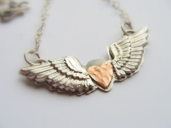 Winged on sale heart necklace