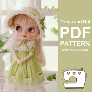 May include: A PDF pattern for a green dress and white hat for Blythe & OB24 dolls. The dress has white lace trim and embroidery. The hat has a white lace trim and a green ribbon. The pattern includes a sewing machine illustration.