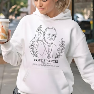 Pope Francis Never Let The Light of Hope Go Out Sweatshirt, God Bless Pope Francis Sweat, Catholic Memorial Tees Hoodie, Religious Gift