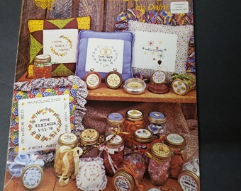 Mini mensajes 18 patrones de punto de cruz vintage Folleto con frases cortas Los amigos son especiales Hogar dulce hogar Es una niña Niño 1979 bk4260