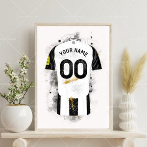 Personalised black and white football family shirt print with custom names and numbers, inspired by Newcastle style