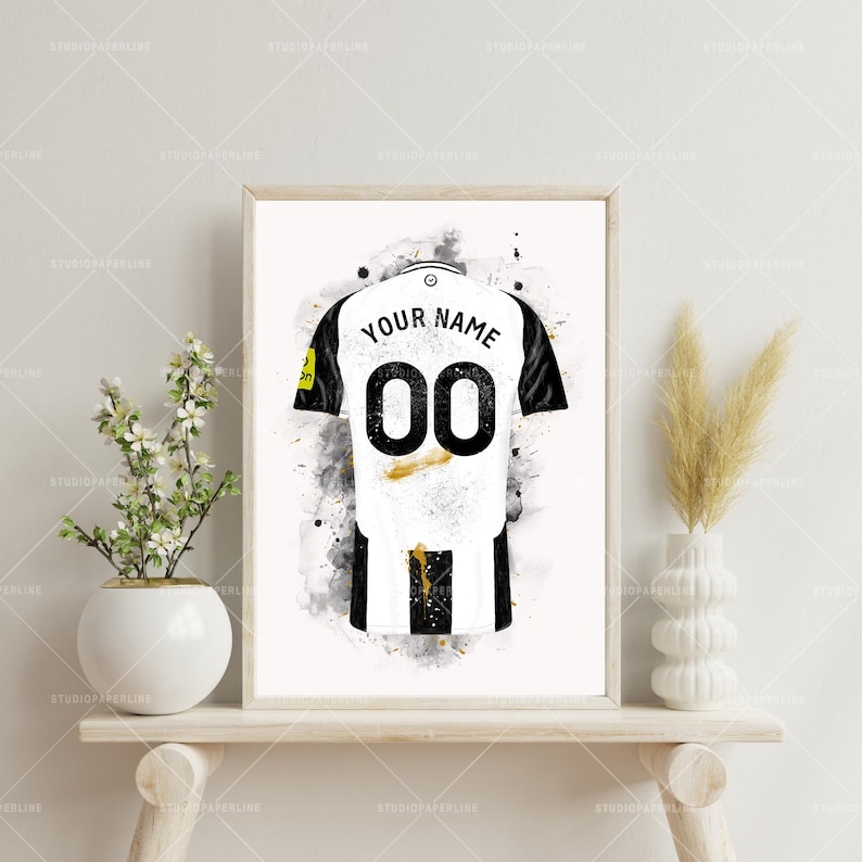 Personalised black and white football family shirt print with custom names and numbers, inspired by Newcastle style