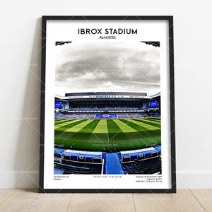 May include: A white ceramic mug with a black handle and the text "But First, Coffee" in a black, bold font. The mug is on a white surface.