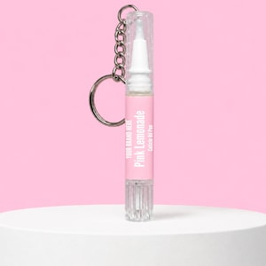 Canetas de óleo para cutículas personalizadas, canetas de óleo para cutículas com chaveiro para uso em salões de beleza ou lojas.