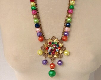 Rhinestone button and pearl necklace