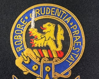 Geborduurd embleem jonge Schotse clan
