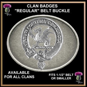 May include: Silver-toned metal belt buckle with a clan crest featuring a dragon and the text "VIRTUTI FORTUNA CONJUNCTA". The buckle is designed to fit a 1 1/2 inch belt or smaller.  Available for all clans.