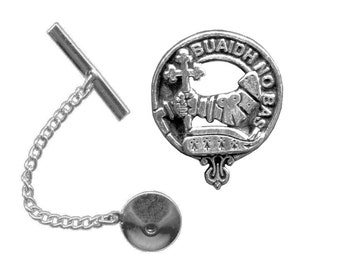 May include: A silver tie tack with a chain and a round charm featuring a crest with the text "BUAIDH NO BAS".