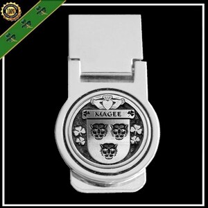 May include: Silver money clip with a round, engraved design featuring the Magee family crest. The crest includes three black lions, a heart, and shamrocks.