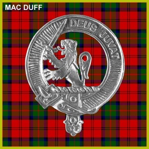 May include: A silver clan crest with a lion rampant holding a sword, surrounded by a circle with the text "DEUS JUVAT" on a red and green tartan background. The text "MAC DUFF" is at the top of the image.
