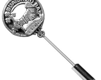 May include: Silver-toned clan crest pin with the text "BUAIDH NO BAS" and a stylized image of a boot. The pin has a long, thin stem and a silver-toned cap.