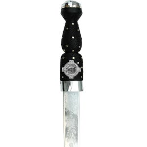 May include: A black and silver Scottish dirk with a decorative handle and engraved blade. The handle is wrapped in black material with silver studs. A silver emblem with a bear is on the handle. The blade has an engraved floral design.
