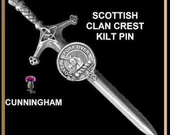 May include: Silver Scottish clan crest kilt pin featuring a unicorn and the text "Fork Over", "Cunningham" and "CKPL02".