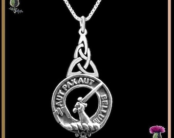 May include: Silver Celtic knot pendant necklace with a round silver charm featuring a hand holding a sword and the text "S AUT PAX AUT BELLUM".