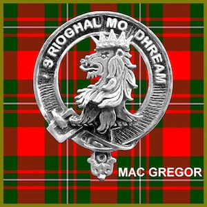 May include: A silver and black clan crest with a lion and the text "S Rioghal Mo Dhream" and "MAC GREGOR" on a red and green tartan background.