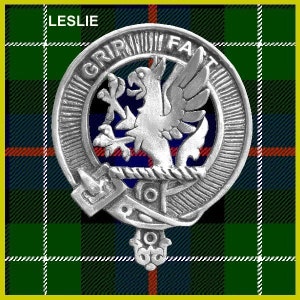 May include: A silver metal clan crest with the text "GRIP FAST" around the outside. The crest features a silver eagle with a red and blue background. The text "LESLIE" is in the upper left corner of the image.
