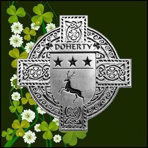 May include: A silver Celtic cross with a silver shield in the center. The shield has three stars and a stag. The text "DOHERTY" is above the shield.