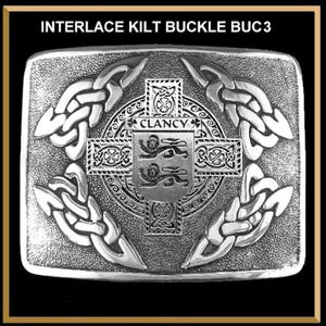 May include: A rectangular silver-coloured kilt buckle featuring an intricate Celtic knotwork border and a central cross design. The centre displays a shield with the text CLANCY and two lions. The text INTERLACE KILT BUCKLE BUC3 is at the top.