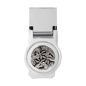 May include: A silver-colored money clip with a circular Celtic knot design. The clip has a rectangular top and a hinged mechanism. The Celtic knot design features intertwined figures and patterns.