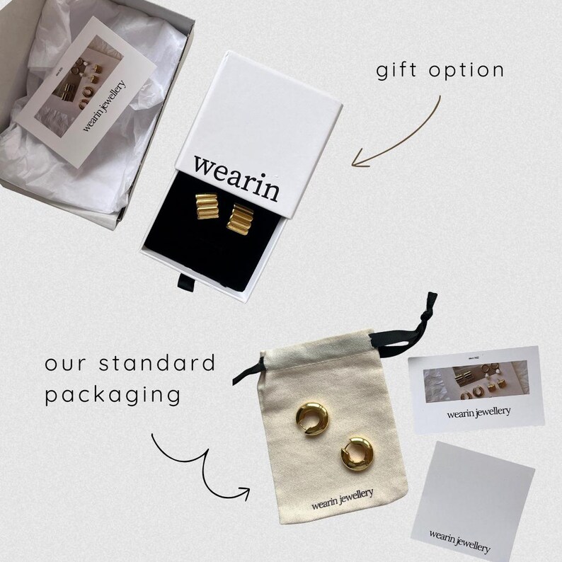 May include: A pair of gold-toned ribbed hoop earrings inside a white sliding box labeled wearin, and a pair of gold-toned smooth hoop earrings on a beige drawstring pouch labeled wearin jewellery, accompanied by branded cards and tissue paper.