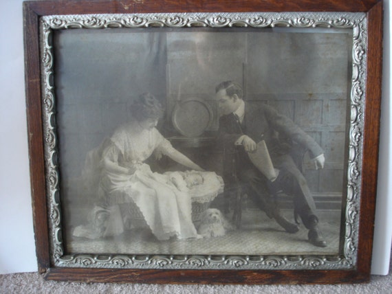 framing antique baby clothes