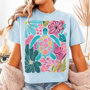 Boho floral sea turtle PNG with pink, blue, turquoise, and green colors for summer sublimation designs, beach shirts, and DTF prints.