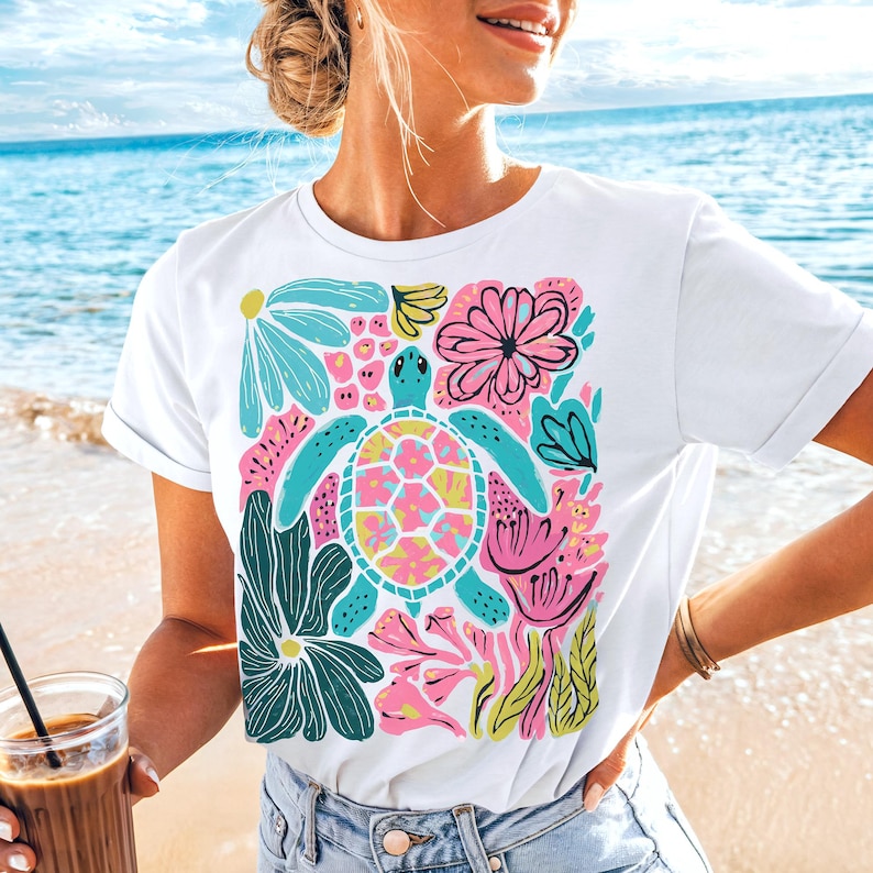 Boho floral sea turtle PNG with pink, blue, turquoise, and green colors for summer sublimation designs, beach shirts, and DTF prints.