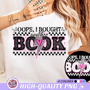 May include: A white t-shirt with black and white checkered pattern and the text "Oops, I bought another book" in black with a pink lightning bolt and heart. The text is in a retro style font.