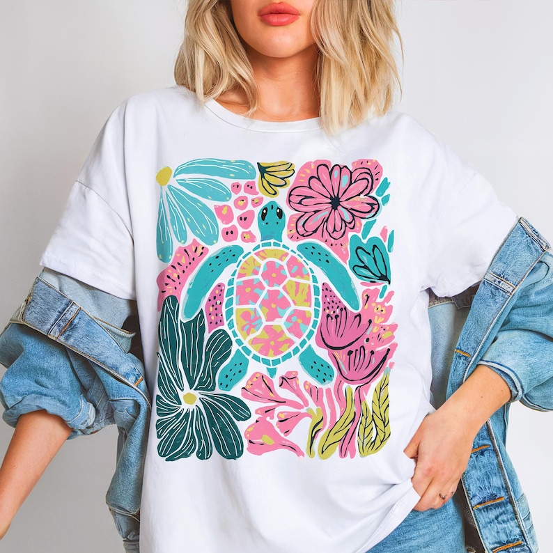Boho floral sea turtle PNG with pink, blue, turquoise, and green colors for summer sublimation designs, beach shirts, and DTF prints.