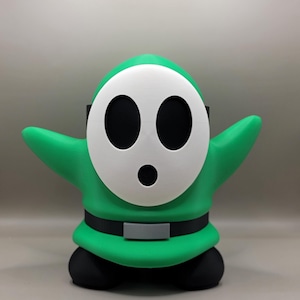 Green Super Mario Shy Guy Action Figure - Collectible Nintendo Character Toy - Perfect Gift for Mario Fans - Detailed & High Quality