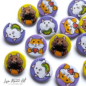 May include: A collection of 10 round button badges featuring various illustrations of hamsters eating different foods. The badges are on a white background. The hamsters are depicted in various poses and expressions, with some holding hearts, kiwi slices, and other treats. The badges are a mix of purple and yellow backgrounds.
