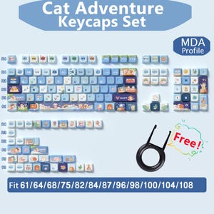 May include: A set of blue and white cat-themed keycaps with a cartoon cat design. The keycaps are arranged in rows and columns, with the letters of the alphabet and other symbols printed on them. The keycaps are designed for a mechanical keyboard and are compatible with 61, 64, 68, 75, 82, 84, 87, 96, 98, 100, 104, and 108 key layouts. The keycaps are made of PBT plastic and have a MDA profile. The keycaps are also compatible with a variety of keyboard switches. The keycaps are packaged in a clear plastic bag. The keycaps are a fun and unique way to personalize your keyboard.