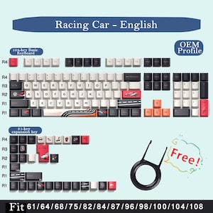 May include: A keyboard keycap set with a racing car theme. The set includes keys with car graphics, road designs, and the text "Racing Car - English". The set is compatible with 61/64/68/75/82/84/87/96/98/100/104/108 keyboards.