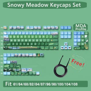 May include: A set of keycaps with a snowy meadow design. The keycaps are blue, green, and white with a variety of images, including mountains, trees, and sheep. The keycaps are compatible with 61, 64, 68, 82, 84, 87, 96, 98, 100, 104, and 108 key keyboards. The keycaps are made of PBT plastic and have a MDA profile.