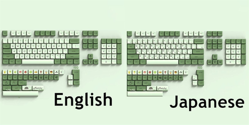 May include: A green and white keyboard with two different layouts: English and Japanese. The English layout has a standard QWERTY keyboard with green keycaps and white lettering. The Japanese layout has a similar design with green keycaps and white lettering, but with additional keys for Japanese characters.